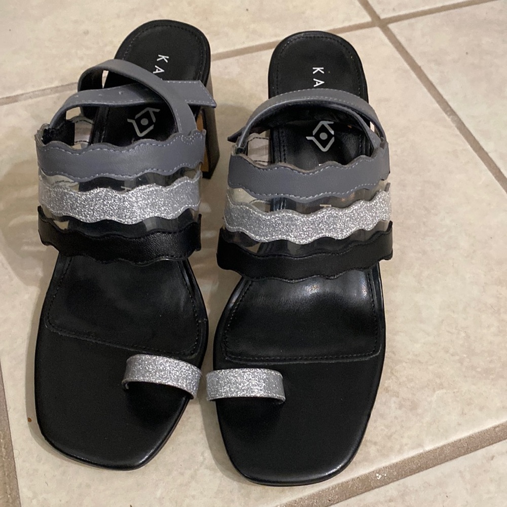 Katy Perry black, gently used silver, and gray leather heel sandals.